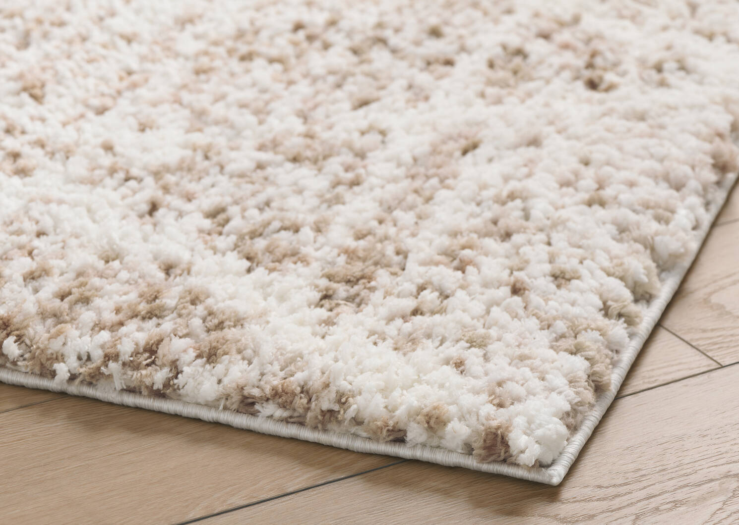 Tapis Kipton 63x90 sable/blanc